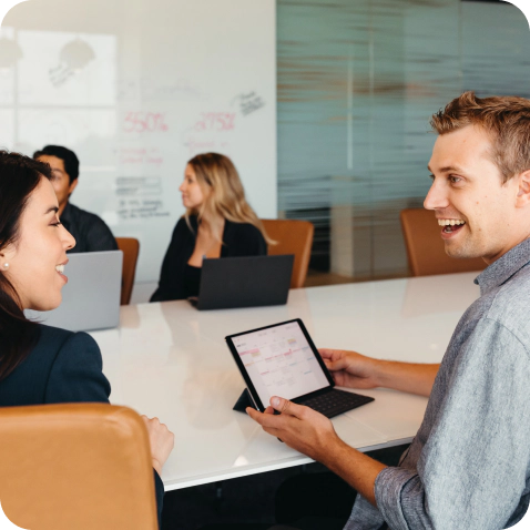 Two business people in conversation.